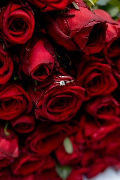 Engagement ring in red roses  gold ring with diamond