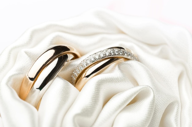 Engagement rings on background close up