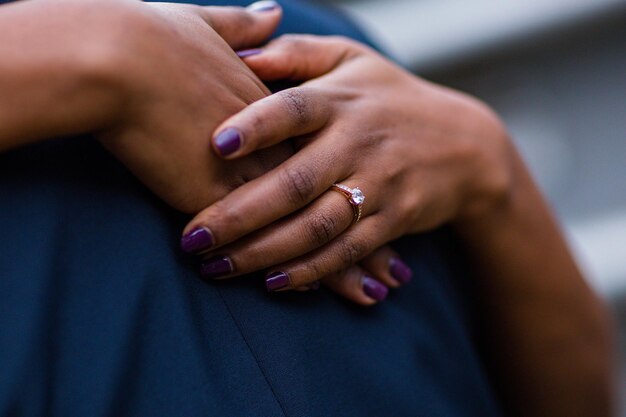 Photo engagement wedding ringthe couple hands htogether in kenya