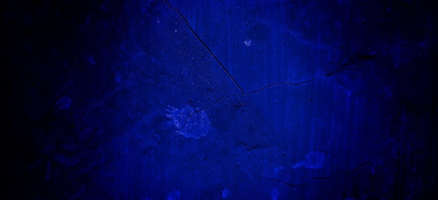 Enge donker blauwe grunge textuur voor achtergrond donker blauwe muur horror concept