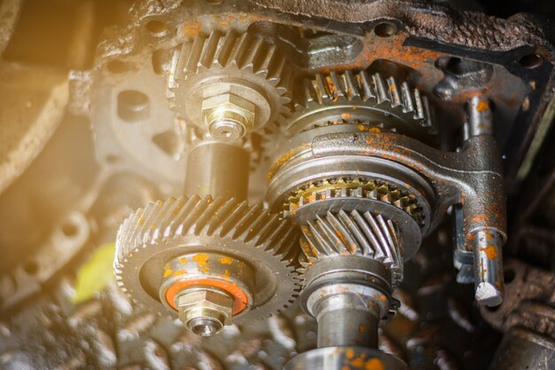 engine gear wheel remove from car with dirty oil and rust