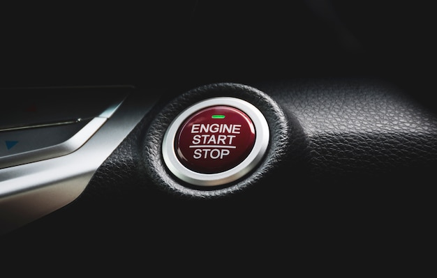 Engine start / stop button of luxury car, automotive part\
concept.