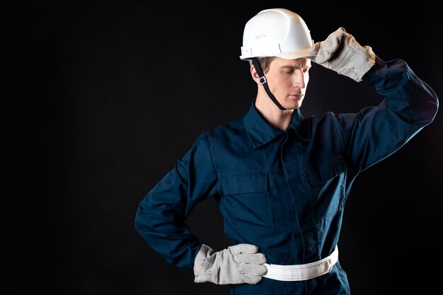 An engineer or architect on a construction site a man in a robe