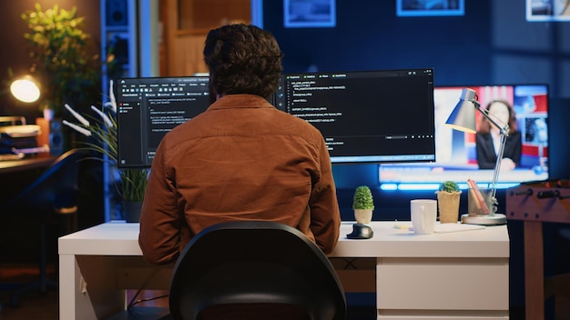 Engineer arrives in home office with coffee mug in hand ready to start coding