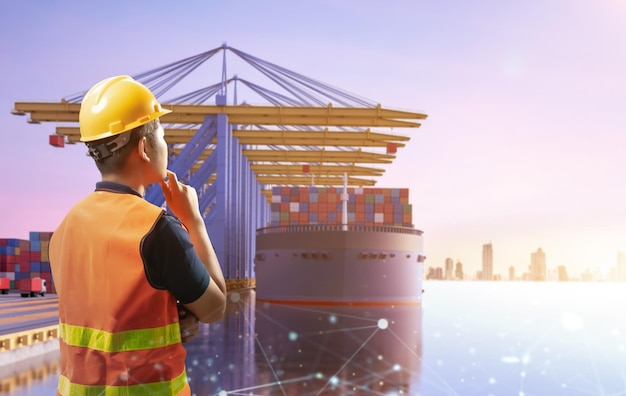 Engineer or asian worker work at container terminal port