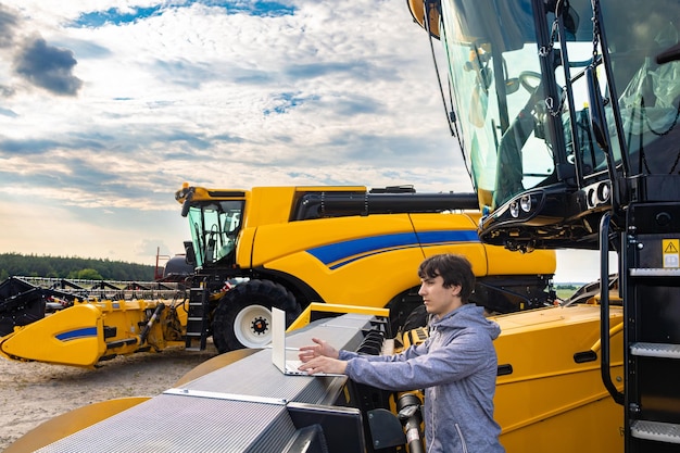 Engineer configures agricultural machinery