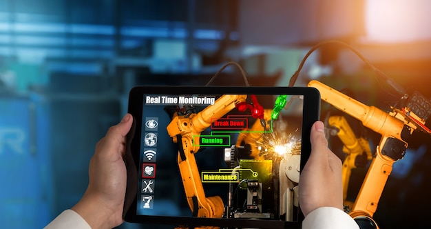 Engineer controls robotic arms by augmented reality industry technology