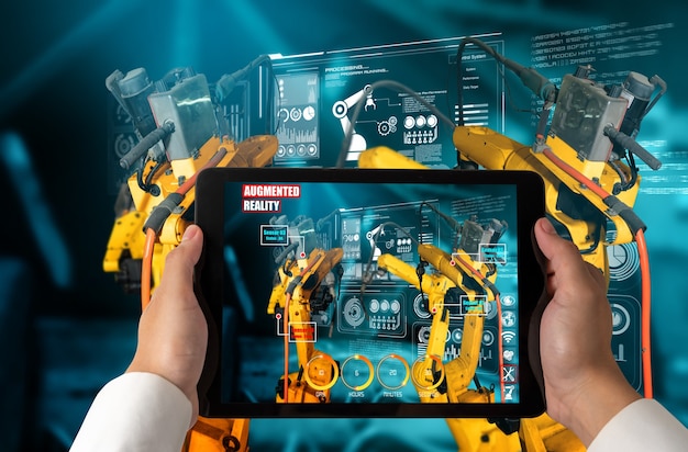 Engineer controls robotic arms by augmented reality industry technology