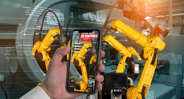 Engineer controls robotic arms by augmented reality industry technology