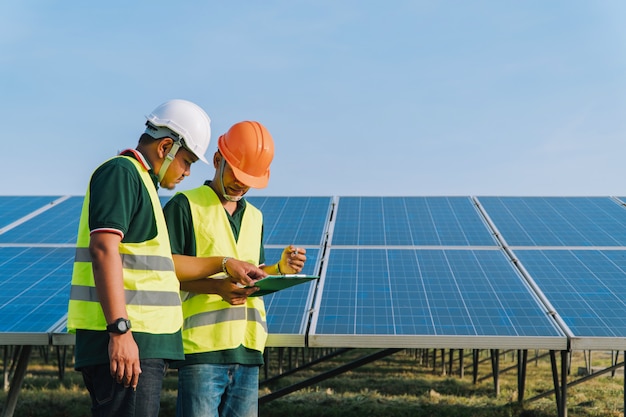  Engineer inspect solar panel  at solar power plant 