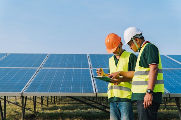  Engineer inspect solar panel  at solar power plant 
