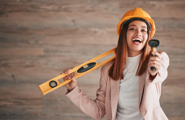 Photo engineer laugh business woman and portrait of a property management worker with construction tools mockup stud detector and engineering gear for a home renovation project with a happy employee