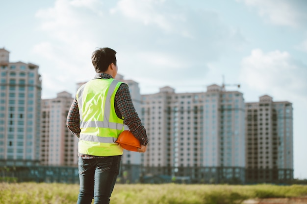 Engineer man working or checking at construction building site