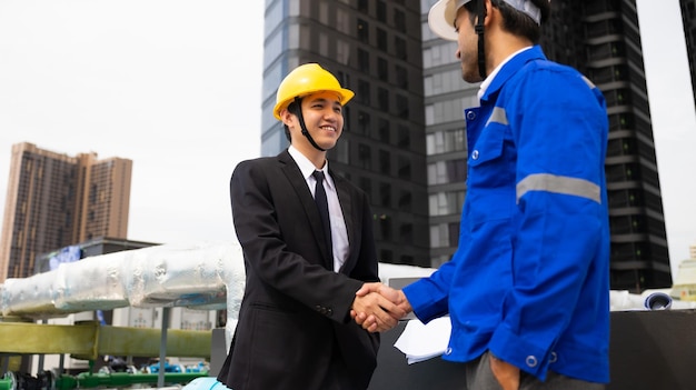 Engineer People and business man ceo shaking hands on business cooperation agreement Successful hand shaking after good deal