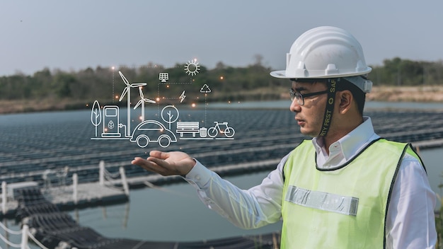 Engineer pointing finger or Hand with an icon of energy with a solar cell