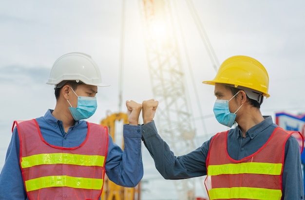 Engineer Shake hand Team Engineer do Job on site construction, Architecture teamwork, Team Hand shake