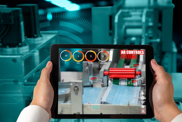 Engineer use augmented reality software in smart factory production line