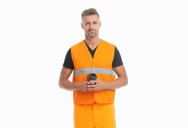 Engineer with coffee isolated on white studio Man in safety vest having coffee break