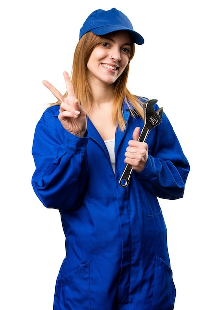 Engineer woman making victory gesture