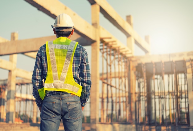 Engineer working on building site