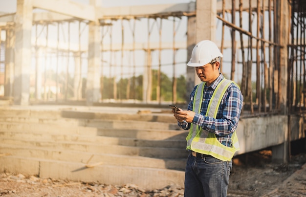 Engineer working on building site