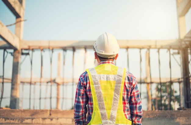 Engineer working on building site