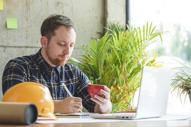 Photo engineer working at office