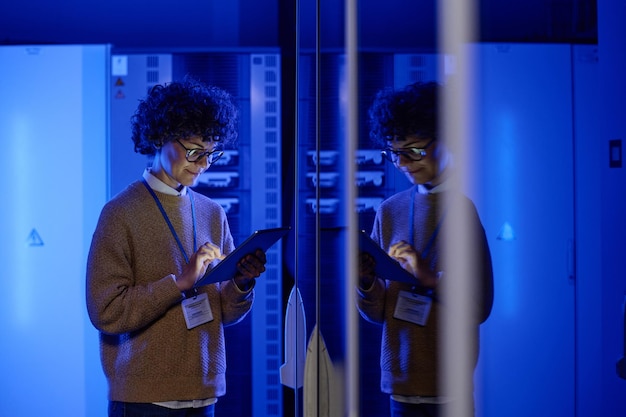 Engineer working at server room