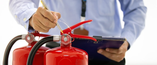 Engineering checking pressure gauge of fire extinguishers tank