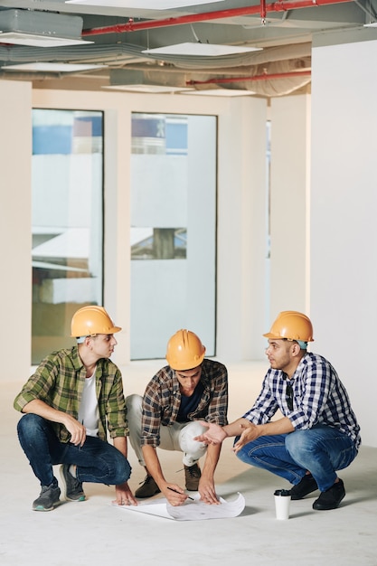 Engineers Correcting Building Plan