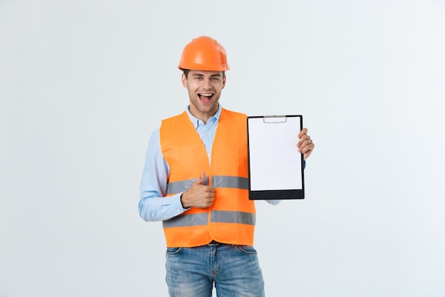 Engineers examining documents on clipboard isolated over white background.