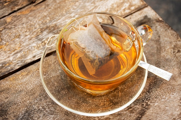 England jasmine tea in glass cup serve on plate at cafe coffee shop in Chiang Mai Thailand