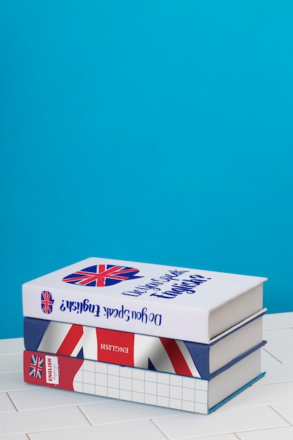 Photo english books arrangement on white table