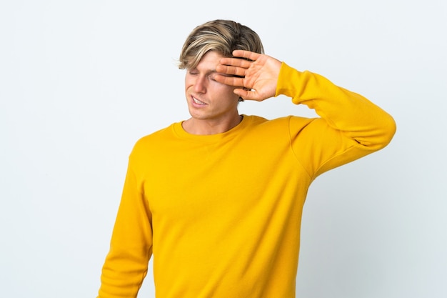 English man over isolated white wall with tired and sick expression