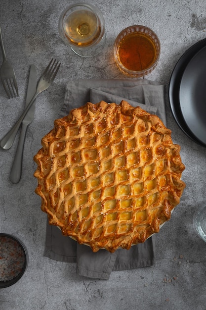 English meat pie pork pie traditional british pie freshly baked\
homemade savory pies with golden crust pie with pastry decoration\
on top food photography food styling english cuisine