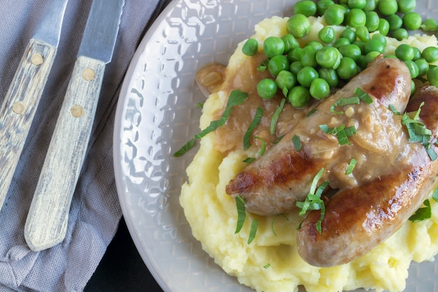 English sausages with mashed potatoes and gravy.