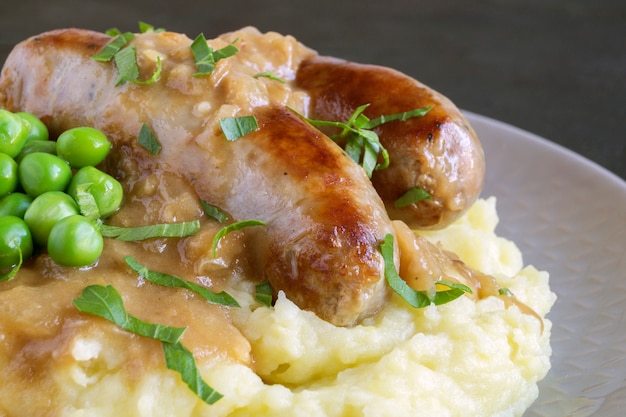 English sausages with mashed potatoes and gravy.