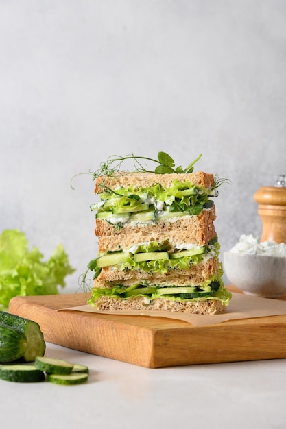 English tea sandwiches with ricotta cucumber microgreens and dill