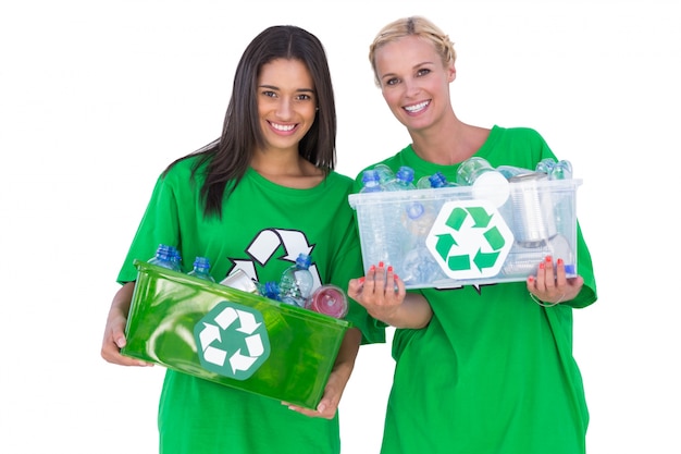 Enivromental activists holding box of recyclables