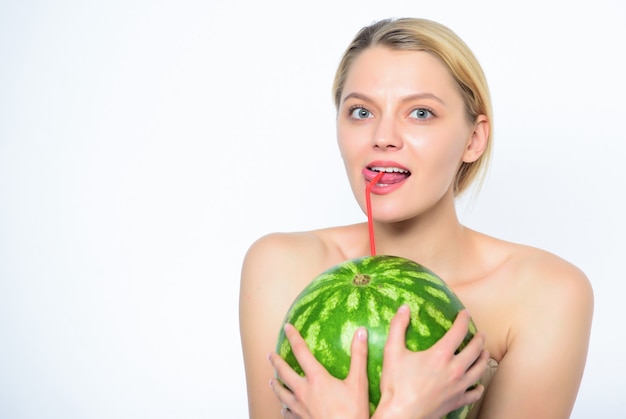 Enjoy natural juice. Girl thirsty attractive nude drink fresh juice whole watermelon cocktail straw white background. Pure pleasure concept. Watermelon vitamin beverage. Thirst and water balance.