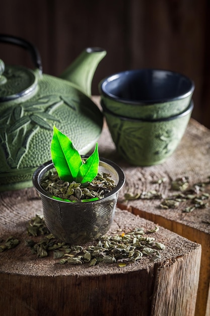 Enjoy your green tea on old wooden stump