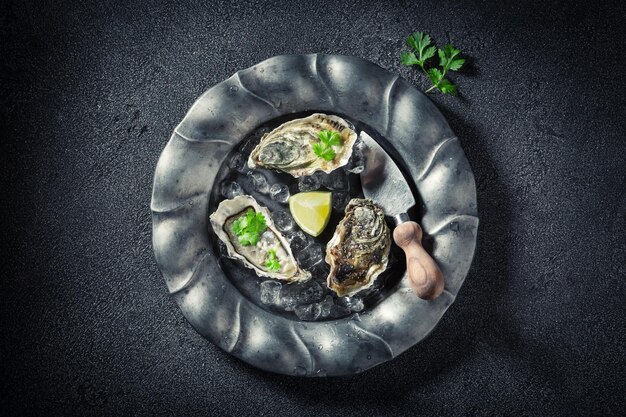 Enjoy your oysters on ice with lemons