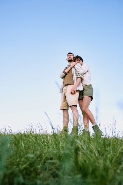 Enjoying beauty of country scape together with boyfriend