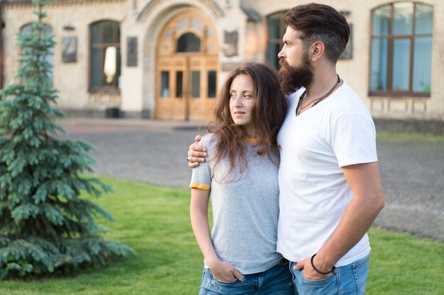 Enjoying close relationship. Sensual woman and bearded man having romantic relationship. Loving relationship between hipster and sexy girl. True love in relationship.