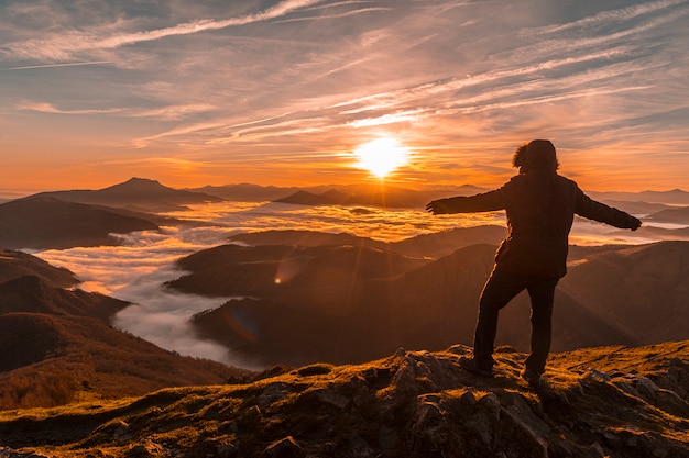 Enjoying the sunrise from Peñas de Aia. Basque Country