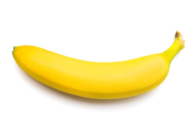 Foto enkele banaan tegen witte achtergrond