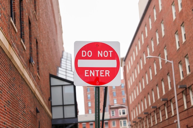 A do not enter sign is on a pole