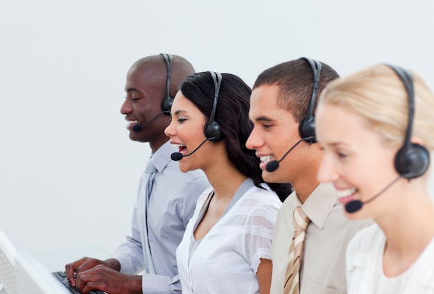 Photo enthusiastic business people working in a call center