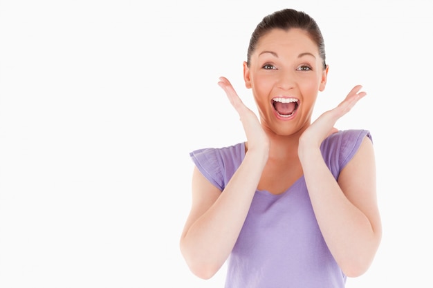 Enthusiastic woman posing while standing