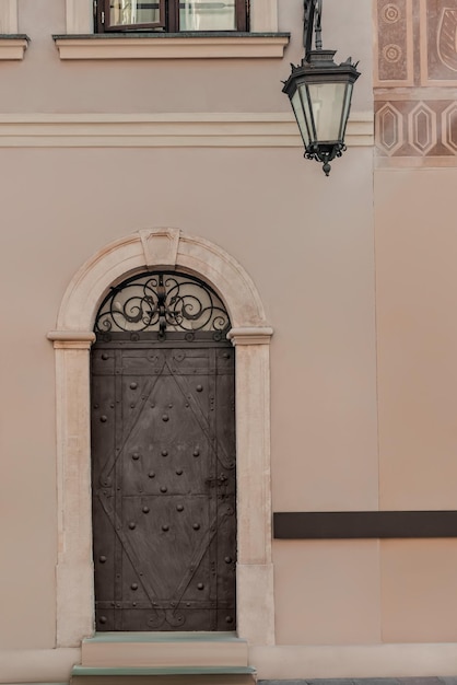 Entrance of building with grey door and stairs